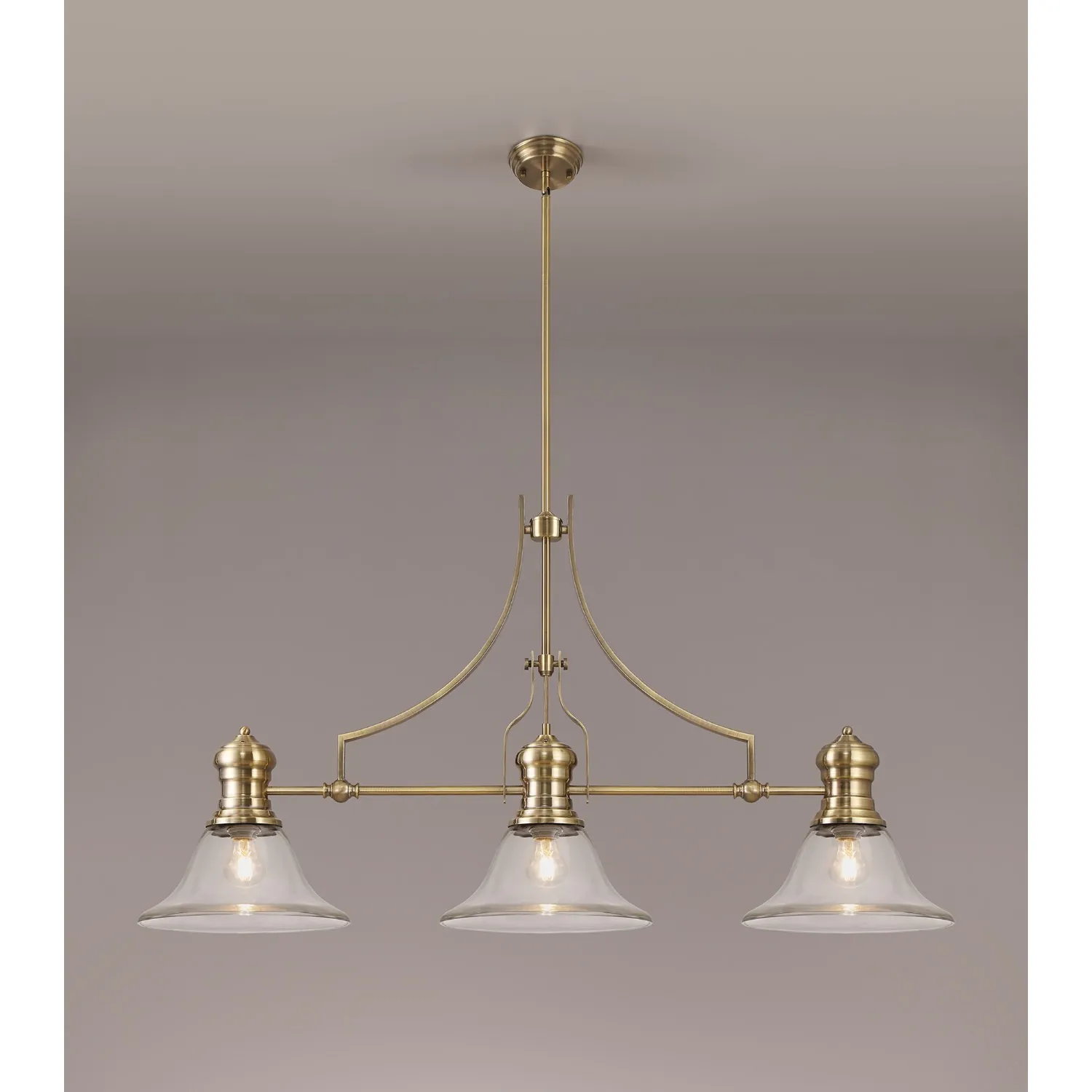 Sandy 3 Light Linear Pendant E27 With 30cm Smooth Bell Glass Shade, Antique Brass, Clear