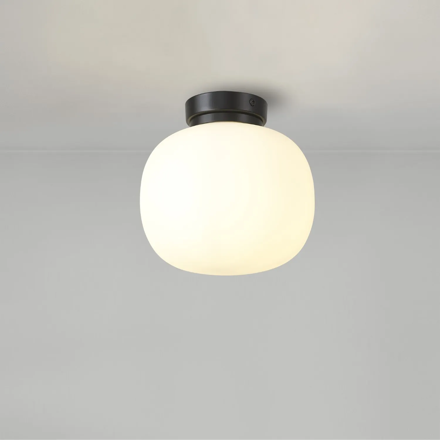 Sevenoaks Small Oval Ball Flush Fitting 1 Light E27 Matt Black Base With Frosted White Glass Globe